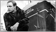 Marlon Brando as Terry Malloy, a dockwork- er and former prizefighter